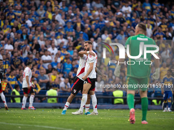 River Plate players celebrate after their team defeats Boca Juniors in an Argentine soccer league match at La Bombonera stadium in Buenos Ai...