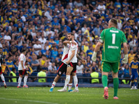 River Plate players celebrate after their team defeats Boca Juniors in an Argentine soccer league match at La Bombonera stadium in Buenos Ai...