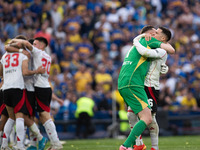 River Plate players celebrate after their team defeats Boca Juniors in an Argentine soccer league match at La Bombonera stadium in Buenos Ai...