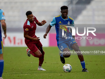 Thaylor Aldama of Gzira United closely follows Simon Zibo of Sliema Wanderers during the Malta 360 Sports Premier League soccer match betwee...