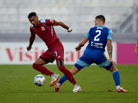 Thaylor Aldama of Gzira United moves with the ball away from the close challenge of Jean Borg of Sliema Wanderers during the Malta 360 Sport...