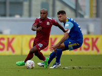 Alex Da Paixao Alves (L) of Gzira United is followed by Murilo Henrique Freire Bernardo (R) of Sliema Wanderers during the Malta 360 Sports...