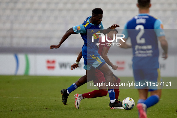 Thaylor Aldama of Gzira United vies for the ball with Simon Zibo of Sliema Wanderers during the Malta 360 Sports Premier League soccer match...