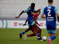 Thaylor Aldama of Gzira United vies for the ball with Simon Zibo of Sliema Wanderers during the Malta 360 Sports Premier League soccer match...