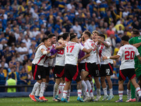 River Plate players celebrate after their team defeats Boca Juniors in an Argentine soccer league match at La Bombonera stadium in Buenos Ai...