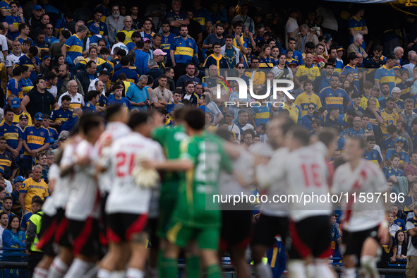 River Plate players celebrate after their team defeats Boca Juniors in an Argentine soccer league match at La Bombonera stadium in Buenos Ai...