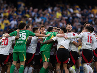 River Plate players celebrate after their team defeats Boca Juniors in an Argentine soccer league match at La Bombonera stadium in Buenos Ai...