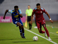 Thaylor Aldama of Gzira United is closely followed by Simon Zibo of Sliema Wanderers during the Malta 360 Sports Premier League soccer match...