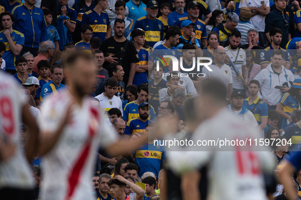 River Plate players celebrate after their team defeats Boca Juniors in an Argentine soccer league match at La Bombonera stadium in Buenos Ai...