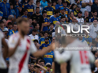 River Plate players celebrate after their team defeats Boca Juniors in an Argentine soccer league match at La Bombonera stadium in Buenos Ai...