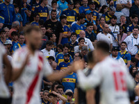 River Plate players celebrate after their team defeats Boca Juniors in an Argentine soccer league match at La Bombonera stadium in Buenos Ai...