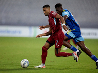 Thaylor Aldama of Gzira United is closely followed by Simon Zibo of Sliema Wanderers during the Malta 360 Sports Premier League soccer match...