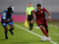 Thaylor Aldama of Gzira United is closely followed by Simon Zibo of Sliema Wanderers during the Malta 360 Sports Premier League soccer match...