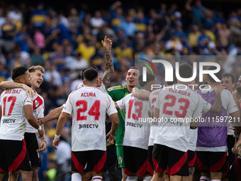 River Plate players celebrate after their team defeats Boca Juniors in an Argentine soccer league match at La Bombonera stadium in Buenos Ai...