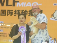 Purebred cats compete at the 2024 Hangzhou International Purebred Cat Tasting Competition in Hangzhou, China, on September 22, 2024. (