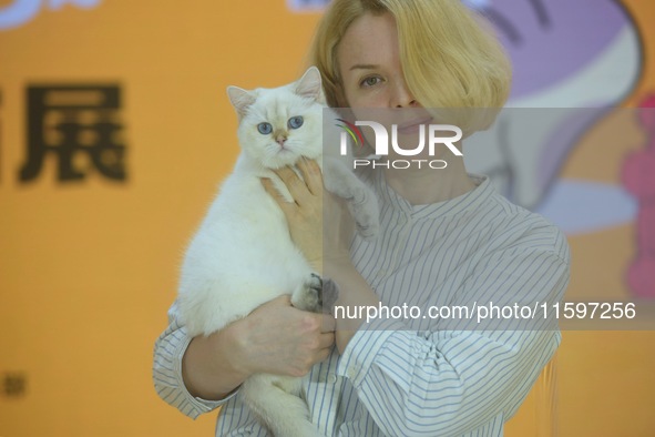 Purebred cats compete at the 2024 Hangzhou International Purebred Cat Tasting Competition in Hangzhou, China, on September 22, 2024. 