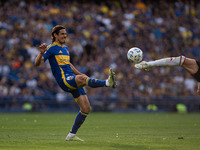 Edinson Cavani of Boca Juniors and Facundo Colidio of River Plate battle for the ball during an Argentine soccer league match at La Bomboner...