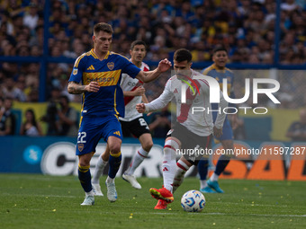 Kevin Zenon of Boca Juniors and Fabricio Bustos of River Plate during an Argentine soccer league match at La Bombonera stadium in Buenos Air...