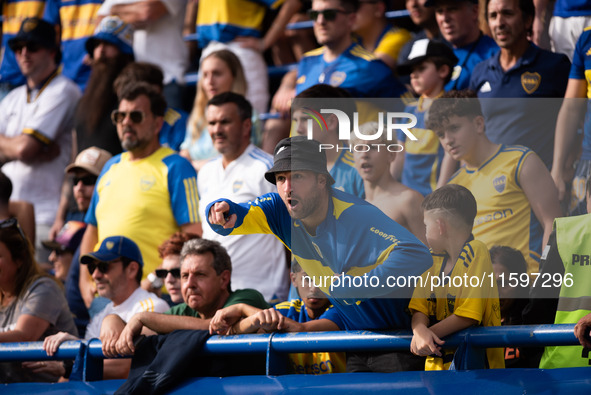 Fans of Boca Juniors during an Argentine soccer league match at La Bombonera stadium in Buenos Aires, Argentina, on September 21, 2024. 