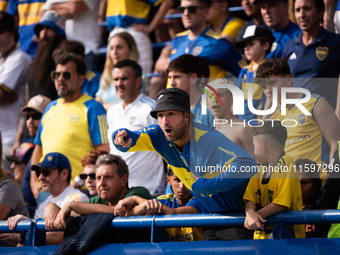 Fans of Boca Juniors during an Argentine soccer league match at La Bombonera stadium in Buenos Aires, Argentina, on September 21, 2024. (