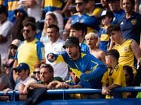 Fans of Boca Juniors during an Argentine soccer league match at La Bombonera stadium in Buenos Aires, Argentina, on September 21, 2024. (