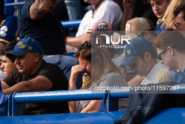 Fans of Boca Juniors during an Argentine soccer league match at La Bombonera stadium in Buenos Aires, Argentina, on September 21, 2024. 