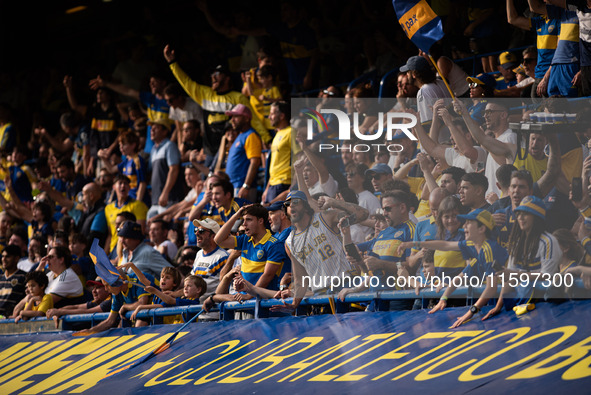 Fans of Boca Juniors during an Argentine soccer league match at La Bombonera stadium in Buenos Aires, Argentina, on September 21, 2024. 