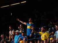 Fans of Boca Juniors during an Argentine soccer league match at La Bombonera stadium in Buenos Aires, Argentina, on September 21, 2024. (