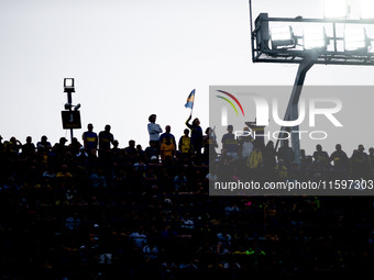 Fans of Boca Juniors during an Argentine soccer league match at La Bombonera stadium in Buenos Aires, Argentina, on September 21, 2024. (