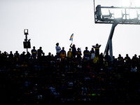 Fans of Boca Juniors during an Argentine soccer league match at La Bombonera stadium in Buenos Aires, Argentina, on September 21, 2024. (