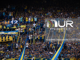 Fans of Boca Juniors during an Argentine soccer league match at La Bombonera stadium in Buenos Aires, Argentina, on September 21, 2024. (