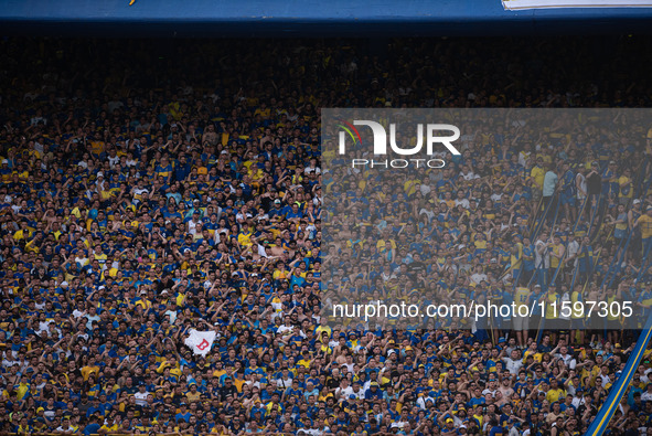 Fans of Boca Juniors during an Argentine soccer league match at La Bombonera stadium in Buenos Aires, Argentina, on September 21, 2024. 