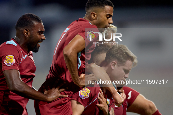 Gabriel Bohrer Mentz (right) of Gzira United celebrates with his teammates after scoring the 1-1 goal from a penalty kick during the Malta 3...