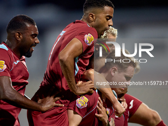 Gabriel Bohrer Mentz (right) of Gzira United celebrates with his teammates after scoring the 1-1 goal from a penalty kick during the Malta 3...