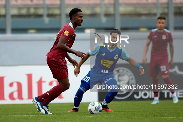 Zuniga Farid (L) of Gzira United is in action during the Malta 360 Sports Premier League soccer match between Gzira United and Sliema Wander...