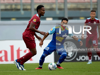 Zuniga Farid (L) of Gzira United is in action during the Malta 360 Sports Premier League soccer match between Gzira United and Sliema Wander...