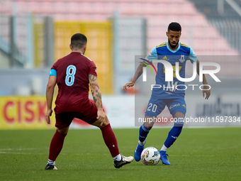 Wescley Matos Da Silva (R) of Sliema Wanderers is in action during the Malta 360 Sports Premier League soccer match between Gzira United and...