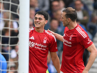 Ramon Sosa of Nottingham Forest celebrates with Chris Wood of Nottingham Forest after scoring a goal to make it 2-2 during the Premier Leagu...