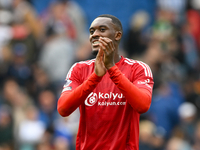 Callum Hudson-Odoi of Nottingham Forest smiles at the Forest supporters during the Premier League match between Brighton and Hove Albion and...