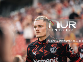 Florian Wirtz of Bayer 04 Leverkusen looks on prior to the Bundesliga match between Bayer 04 Leverkusen and VfL Wolfsburg at Bay Arena in Le...