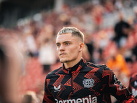 Florian Wirtz of Bayer 04 Leverkusen looks on prior to the Bundesliga match between Bayer 04 Leverkusen and VfL Wolfsburg at Bay Arena in Le...