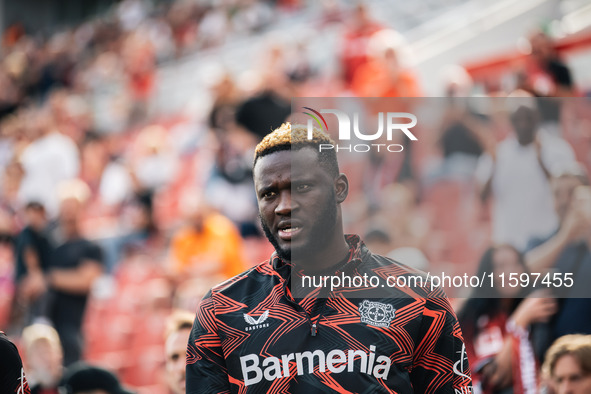 Victor Boniface of Bayer 04 Leverkusen looks on prior to the Bundesliga match between Bayer 04 Leverkusen and VfL Wolfsburg at Bay Arena in...