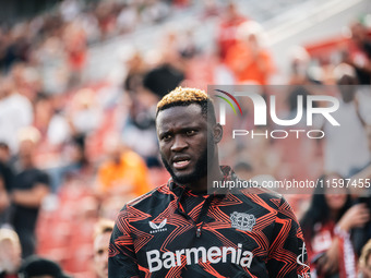 Victor Boniface of Bayer 04 Leverkusen looks on prior to the Bundesliga match between Bayer 04 Leverkusen and VfL Wolfsburg at Bay Arena in...