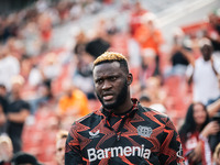 Victor Boniface of Bayer 04 Leverkusen looks on prior to the Bundesliga match between Bayer 04 Leverkusen and VfL Wolfsburg at Bay Arena in...