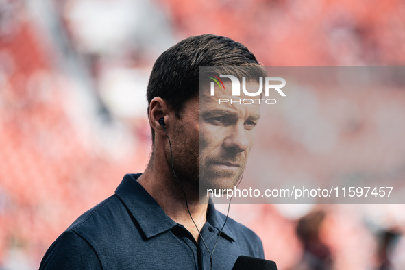 Xabi Alonso, Head Coach of Bayer 04 Leverkusen, looks on prior to the Bundesliga match between Bayer 04 Leverkusen and VfL Wolfsburg at Bay...