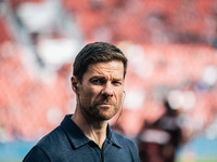 Xabi Alonso, Head Coach of Bayer 04 Leverkusen, looks on prior to the Bundesliga match between Bayer 04 Leverkusen and VfL Wolfsburg at Bay...