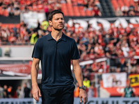 Xabi Alonso, Head Coach of Bayer 04 Leverkusen, looks on prior to the Bundesliga match between Bayer 04 Leverkusen and VfL Wolfsburg at Bay...