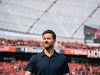 Xabi Alonso, Head Coach of Bayer 04 Leverkusen, looks on prior to the Bundesliga match between Bayer 04 Leverkusen and VfL Wolfsburg at Bay...