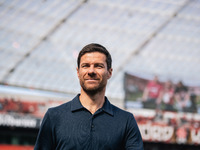 Xabi Alonso, Head Coach of Bayer 04 Leverkusen, looks on prior to the Bundesliga match between Bayer 04 Leverkusen and VfL Wolfsburg at Bay...