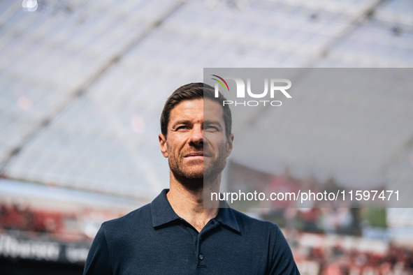 Xabi Alonso, Head Coach of Bayer 04 Leverkusen, looks on prior to the Bundesliga match between Bayer 04 Leverkusen and VfL Wolfsburg at Bay...